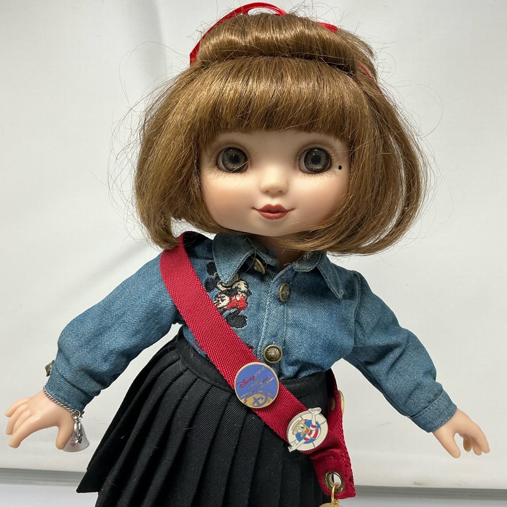 Charming Doll with Denim Outfit and Disney Sash on Stand